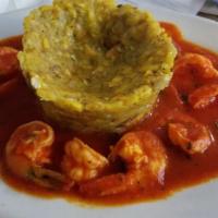 Mofongo Stuffed With Shrimp · Mashed fried green plantain stuffed with shrimp in red sauce