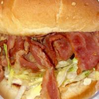 Pastrami Burger   · Quarter-pound charbroiled patty served on a toasted bun topped with pastrami shredded lettuc...