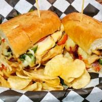 Chicken Cheesesteak Sub · Chicken, bell peppers, lettuce, tomato, onion, provolone cheese, and mayonnaise on a sub rol...