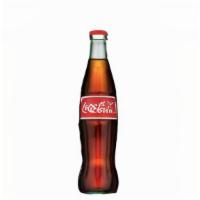 Coke · Can.