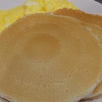Golden Brown Pancakes · (3)Add eggs with additional charge. A choice of meat: ham, bacon, scrapple (Link or patties)...