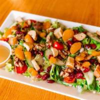 House Salad · Your choice of arugula or chopped romaine lettuce, walnuts, dried cranberries, orange slices...