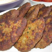 Kotlet · Fried beef and potato patty.