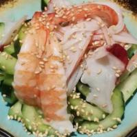 Seafood Sunomono Salad · Refreshing Japanese cucumber salad with octopus, crabs, and shrimp.