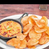 Chips & Smoked Pimento · House cut chips, warm pimento cheese, scallions.