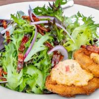 Greenie’S Tomato Salad · Mixed greens, red onion, fried green tomato, smoked pimento cheese, candied bacon, house-mad...