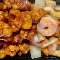 Dragon & Phoenix · Hot & Spicy.One side General Tso's chicken and other side shrimp with Chinese vegetable.