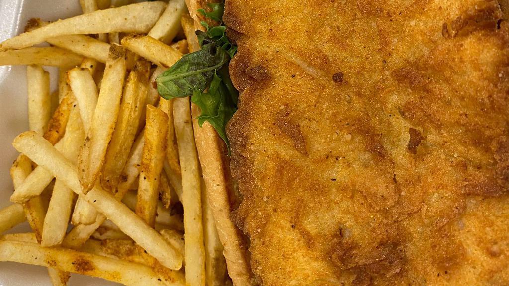 Fish Basket · Choice of fried, blackened or grilled catfish, tilapia or whiting. Served with tartar sauce and your choice of side.