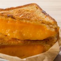Triple Grilled Cheese · Pepper Jack, Cheddar & Monterey Jack on Texas Toast