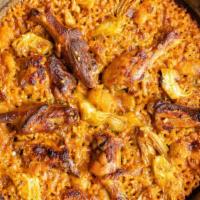 Paella Valenciana · Chicken, rabbit, and duck. Delivered with the paella pan. Made with bomba rice. Serves 2. Gl...
