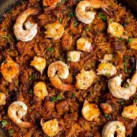 Arroz De Pulpo Y Gambas · Octopus and shrimp. Delivered with the paella pan. Made with bomba rice. Serves 2. Gluten-fr...