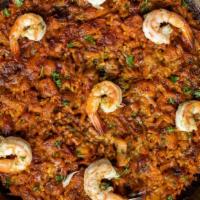 Arroz Abanda · Shrimp, monkfish, and squid. Delivered with the paella pan. Made with bomba rice. Serves 2. ...