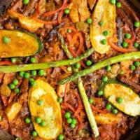 Arroz De La Huerta · Seasonal vegetable paella. Delivered with the paella pan. Made with bomba rice. Serves 2. Gl...