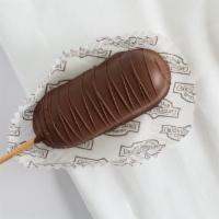 Chocolate Dipped Twinkie · Twinkie, cream filled sponge cake, dipped in milk chocolate