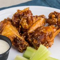 Sweet N Sour Wings · Handspun wings bursting with sweet and sour sauce.