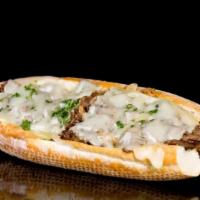 Philly Cheesesteak · Angus beef, melted cheese, caramelized onions and mayo.