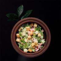 Gustoso'S Caesar Salad · Grated parmesan and garlic croutons.