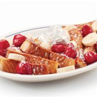 Strawberry Banana French Toast · Our original French toast topped with glazed strawberries & fresh banana slices.