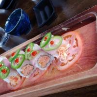 Mind Eraser Roll · Spicy. Insider spicy crabmeat crunch. Outside yellowtail and jalapeño with jalapeño sauce.