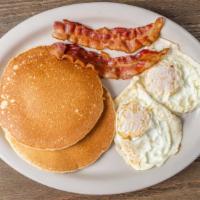 Pancake Breakfast · Two eggs, two pancakes, and a side of bacon.