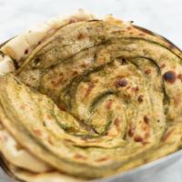 Bread Basket · Naan / Onion and Sage / Mint Paratha.