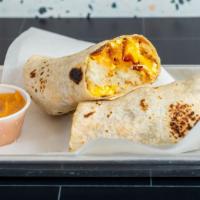 Burrito Breakfast · Two large organic eggs with cheddar cheese, bacon, hash browns wrapped in a flour tortilla a...
