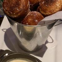Pretzel Bites · Made in Texas. Warm sea salt pretzel bites served with cheese fondue. Add honey clover for a...