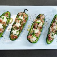 Goatzilla · Jalapeno poppers filled with Natural Goat Cheese topped with bacon