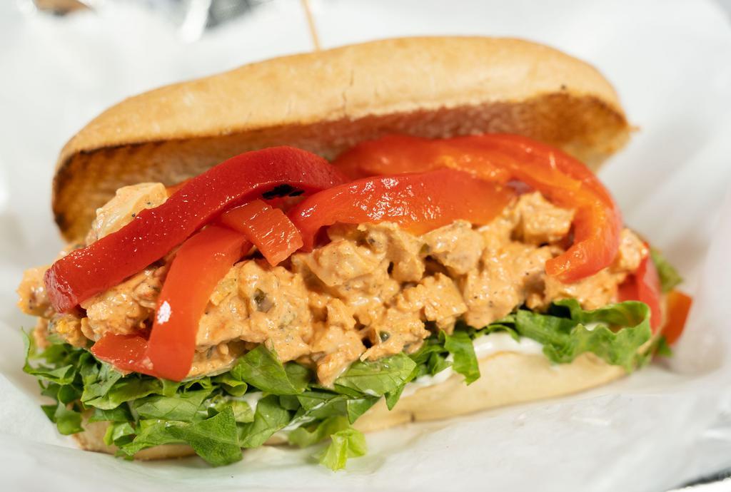 Hellfire Cajun Chicken Salad Sandwich · Chunky grilled salad made with a little bit of Swamp Heat and roasted sweet peppers.