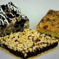 Dessert Bars · 1. Decadent Buttery Toffee & Chocolate 
2. Hazelnut Fudge Brownie w Chopped Hazelnuts
3. Ore...