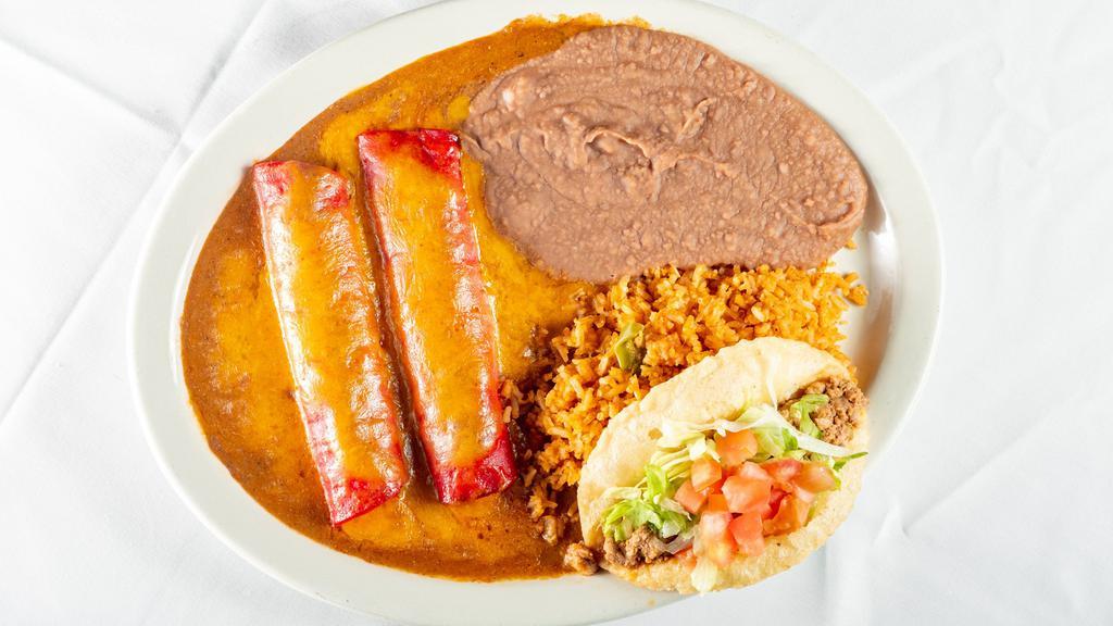 Cheese Mexican Plate · Two cheese enchiladas, one picadillo puffy taco.