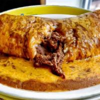 Tejano-Beef Fajita Enchuritto · With rice inside.