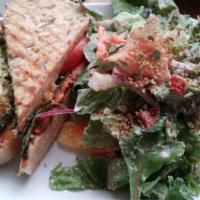 Pesto Panini (Vegan) · Vegan. House made pesto and chipotle sauce on sourdough with cashew cheese basil, red onion ...