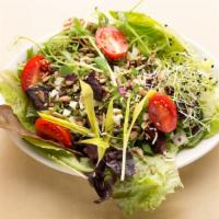 House Green  Salad · Spicy greens, mint, sprouts,
cucumber, red onion
& seasoned garbanzo beans tossed in a lemon...