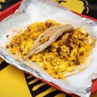Breakfast Tacos · Make it your way!!! Try our Madre's a la mex (sautéed tomato, onion and jalapeno).