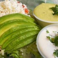 Specialty Flautas Plate · 4 rolled corn crispy tortillas filled with chicken with lettuce, tomato, sour cream and avoc...
