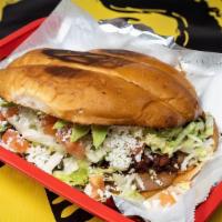 Large Tortas · Choice of meat and it comes with lettuce, tomato, beans, queso fresco, and fresh avocado.