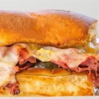 (9) Pastrami Stacker · Meatballs smothered in our mild marinara sauce, provolone, tomato, bell peppers, onions, and...