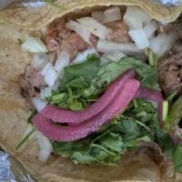 Carnitas · Jackfruit, house orange marinade. Garnished with onions, cilantro, and a side of salsa. Glut...