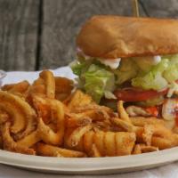 Bbq Chick'N Burger · Chick'n patty, BBQ sauce, lettuce, tomato, pickles, and grilled onions. Fries included.
