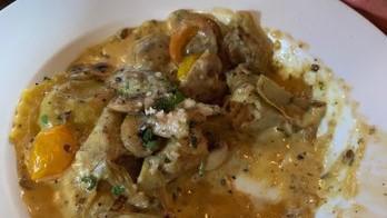 Mushroom Ravioli · Truffle sauce, truffle cheese, mushrooms.