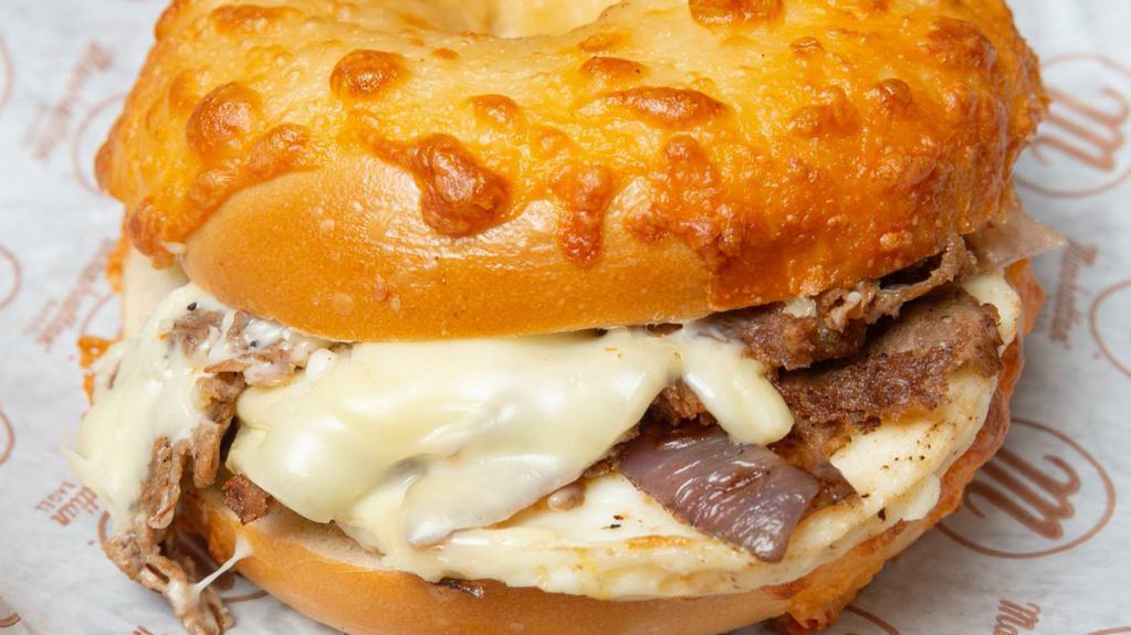 Steak Egg And Cheese · YOUR CHOICE OF BAGEL WITH STEAK, AMERICAN CHEESE AND GRILLED ONION