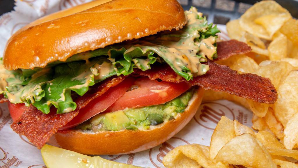 Thin/Avocado Blt · THINTASTIC BAGEL WITH TURKEY-BACON, LETTUCE, TOMATO, AND CREAMY TOMATO SPREAD WITH YOUR CHOICE OF COLESLAW OR MACARONI SALAD.