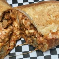 Motorworks  Grinder · A toasted Italian roll stuffed with meatballs, mozzarella, tomato sauce, banana peppers, oni...