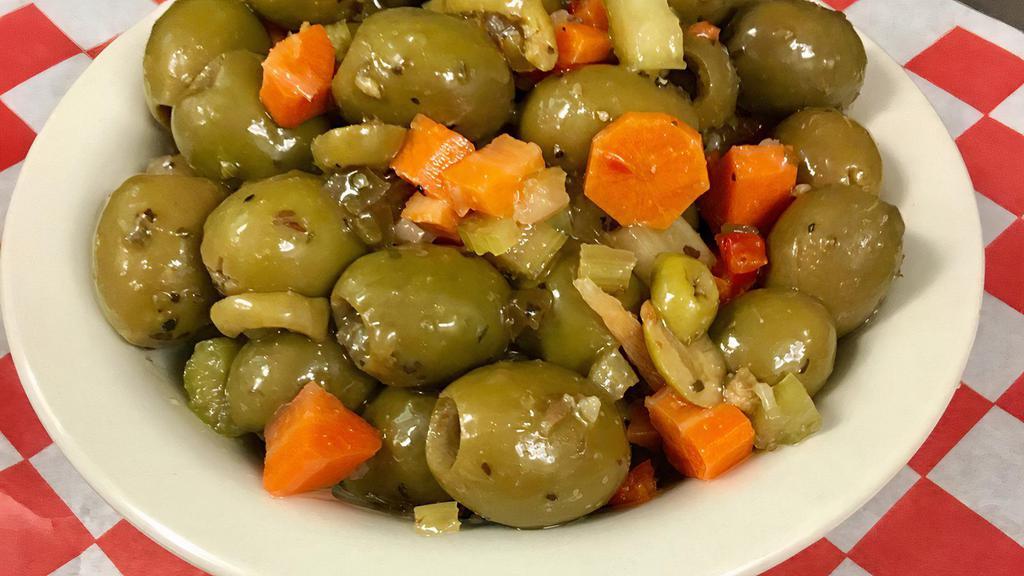 Italian Olive Salad · Sicilian olives, carrots, giardiniera (celery, peppers, carrots), vinegar, Italian seasonings.

Small- 8oz

Medium- 16oz

Large-32oz