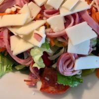 Jovito'S Italian Salad · House salad with Italian dressing, pepperoni, sliced ham, salami, and Provolone cheese.