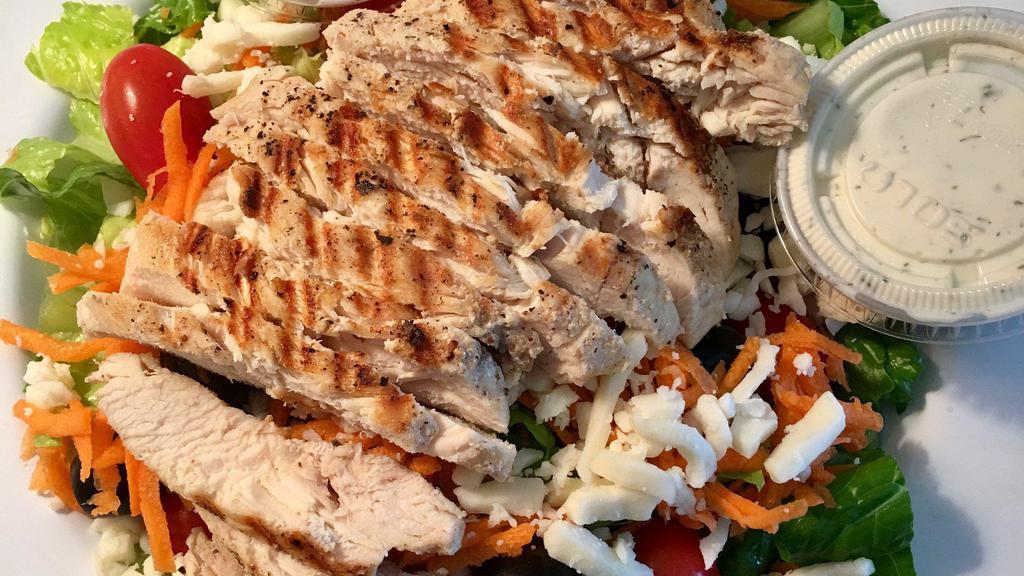 Grilled Chicken Salad · Romaine lettuce with shredded carrots, black olives, cherry tomatoes, Mozzarella cheese, Parmesan ranch and sliced grilled chicken breast.