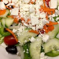 Greek Salad · Romaine lettuce, Feta cheese, kalamata olives, cucumbers, tomato, onion and green peppers, c...