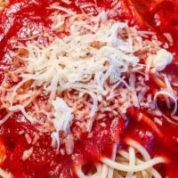 Pasta With Tomato Sauce · Spaghetti or Penne noodles served with our homemade tomato sauce. Garnished with shaved parm...
