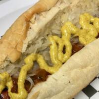 New York Dog · A grilled 1/4 lb all-beef hot dog topped with spicy brown mustard, sauerkraut, and onion sau...